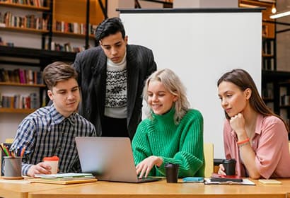 Students learning and reading on campus
